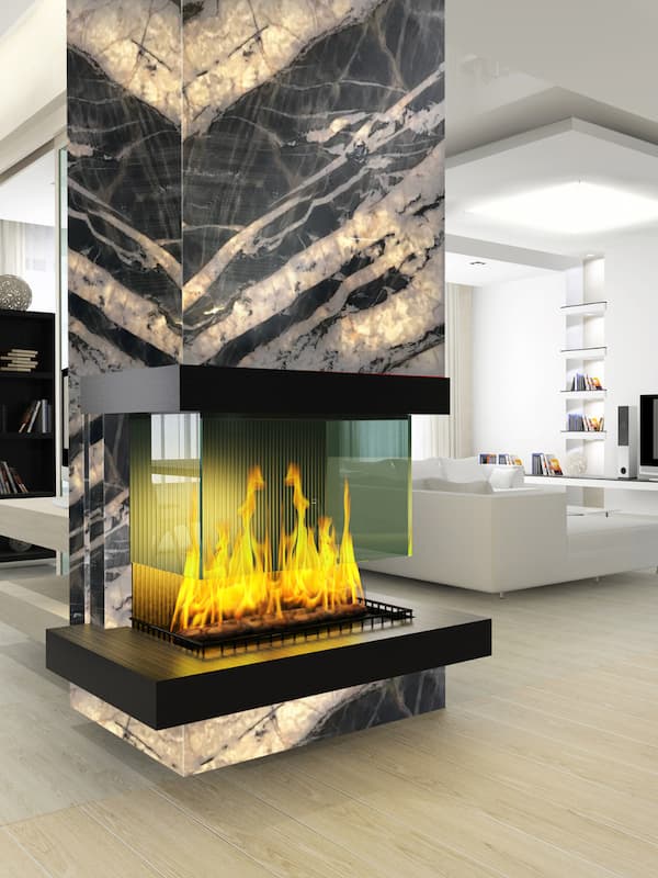 A fireplace with exotic stone slabs decorating the flue, from Francini